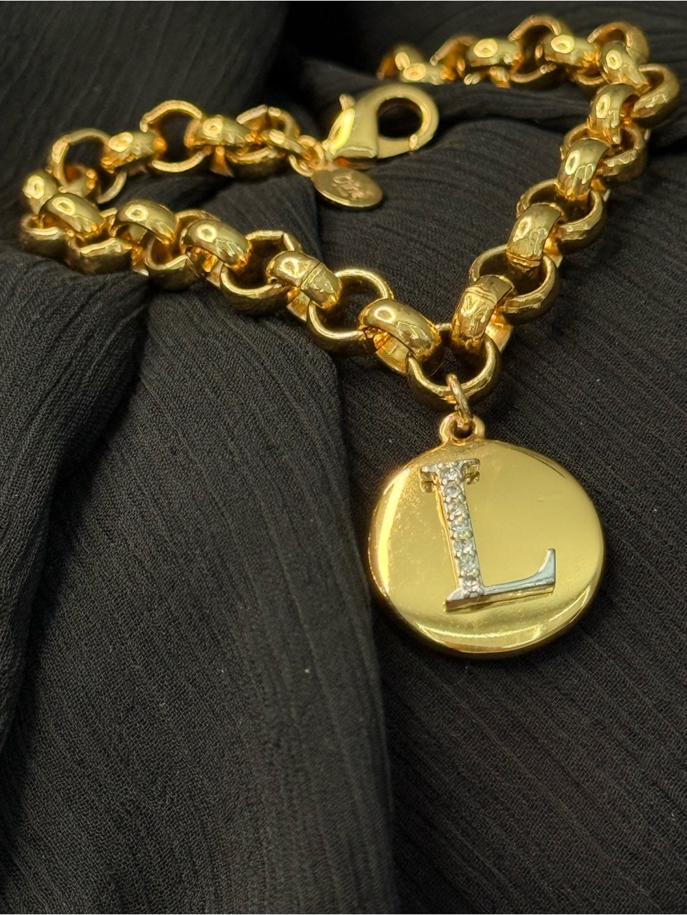 Joan Rivers crystal accented “L” Classic Collection gold-tone initial bracelet!